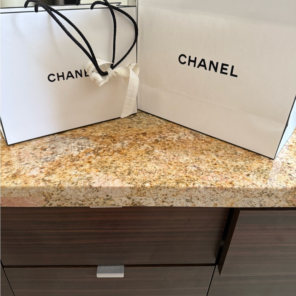 CHANEL White Shopping Bags with Black Accents